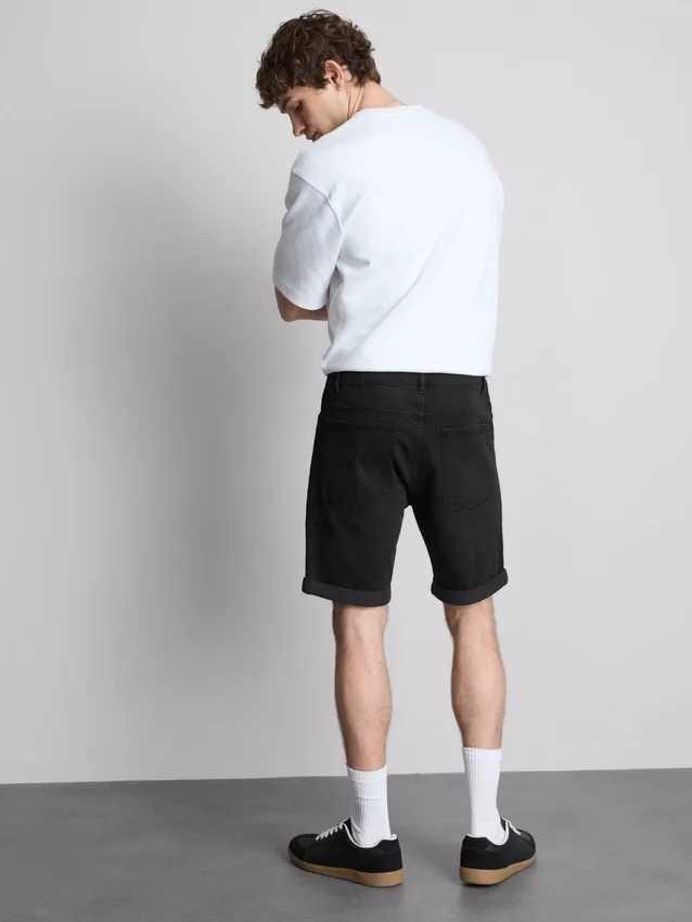 Pantalones cortos de mezclilla ajustados de talle medio