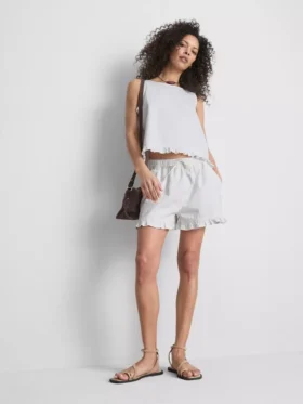 Pantalones cortos de mezclilla con dobladillo con volantes
