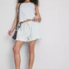 Pantalones cortos de mezclilla con dobladillo con volantes