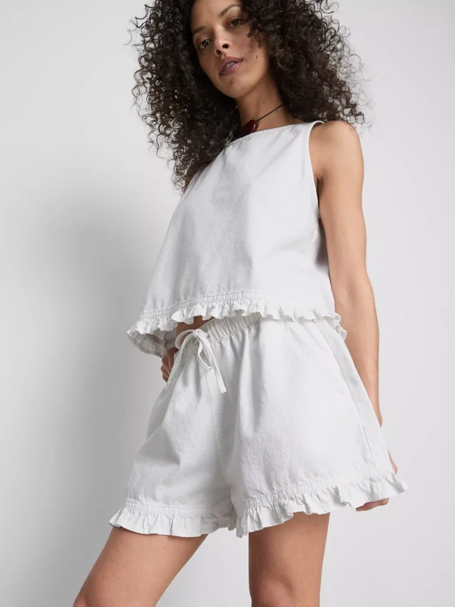 Pantalones cortos de mezclilla con dobladillo con volantes