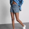 Pantalones cortos de mezclilla de algodón con bolsillos delanteros