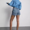 Pantalones cortos de mezclilla de algodón con bolsillos delanteros