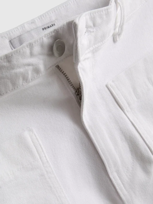 Pantalones cortos de mezclilla de algodón con bolsillos delanteros