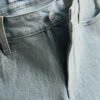 Pantalones cortos de mezclilla de talle medio con dobladillo