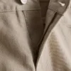 Pantalones cortos de mezclilla de talle medio con dobladillo