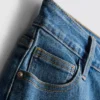 Pantalones cortos de mezclilla de talle medio con dobladillo