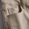 Pantalones cortos de mezclilla de talle medio con dobladillo