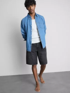 Pantalones cortos de mezclilla holgados de talle medio