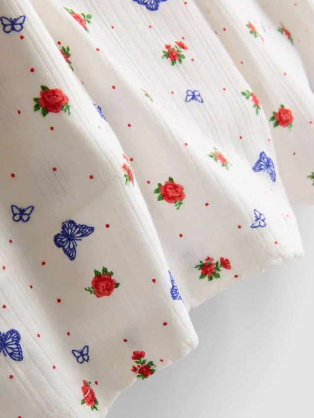 Pantalones cortos de pijama acanalados con estampado de mariposas