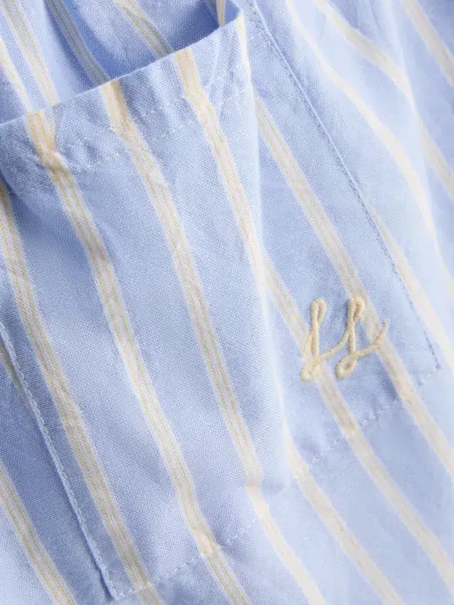 Pantalones cortos de pijama de algodón a rayas estilo Oxford