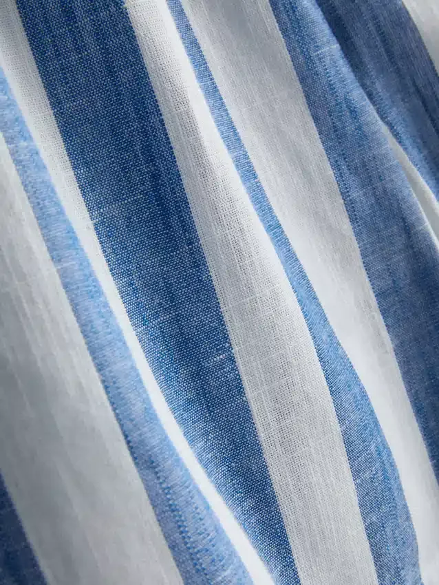 Pantalones cortos de playa de algodón a rayas de corte holgado