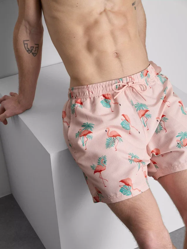 Pantalones cortos de texturizado con estampado de flamencos