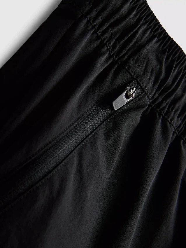 Pantalones cortos deportivos con bloques de color