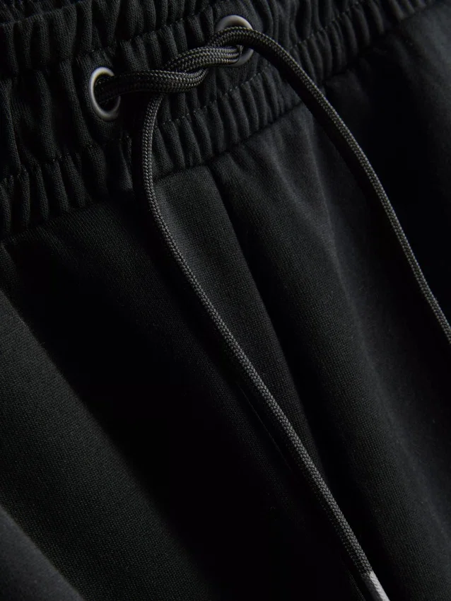 Pantalones cortos deportivos con cordón