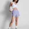 Pantalones cortos deportivos con paneles de malla