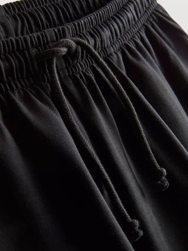 Pantalones cortos holgados de algodón con cordón