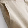 Pantalones cortos plisados de mezcla de lino