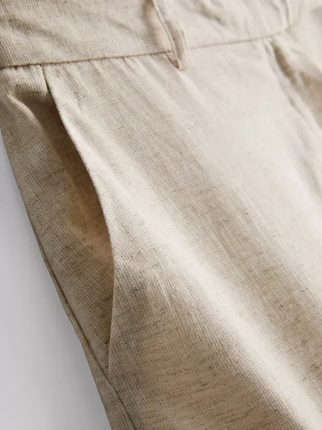 Pantalones cortos plisados de mezcla de lino