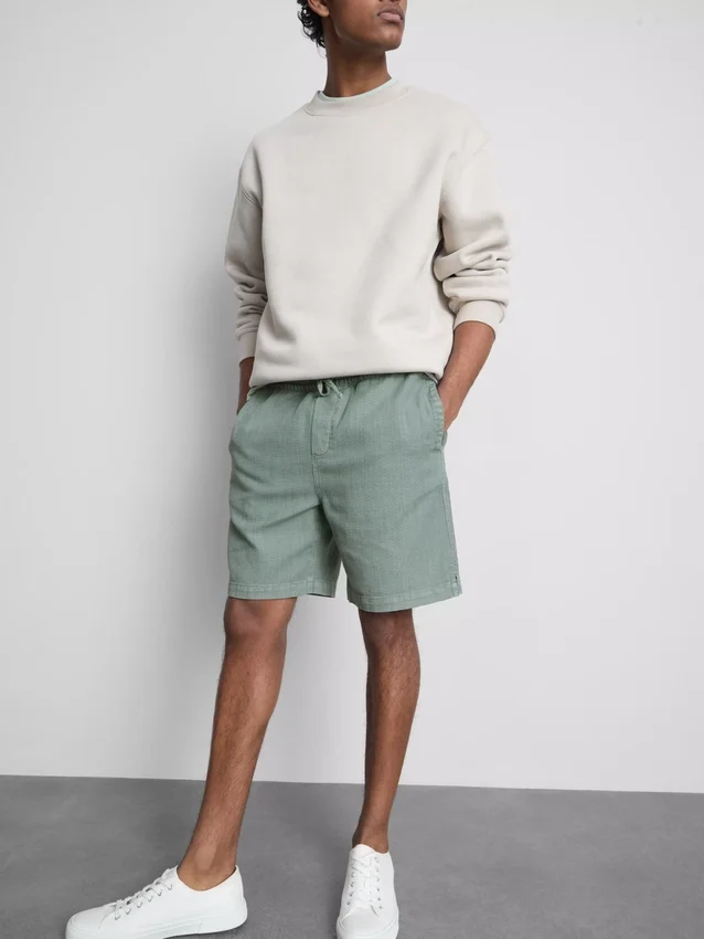 Pantalones cortos texturizados con cordón