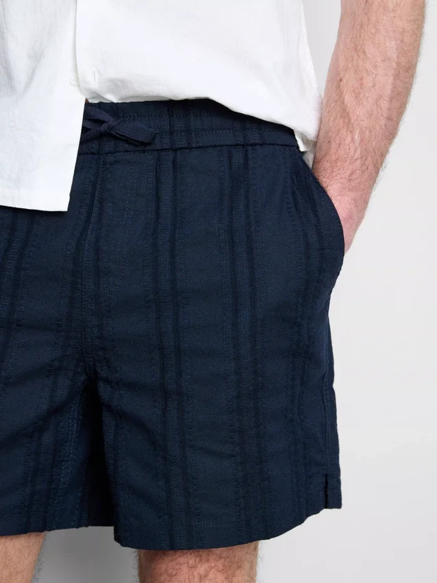 Pantalones cortos texturizados con cordón