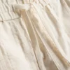 Pantalones cortos texturizados con cordón