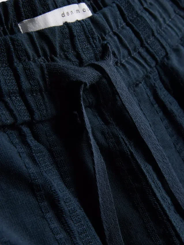 Pantalones cortos texturizados con cordón