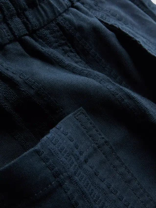 Pantalones cortos texturizados con cordón