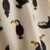 Pantalones cortos tipo bermuda con estampado de tucán y cintura con cordón