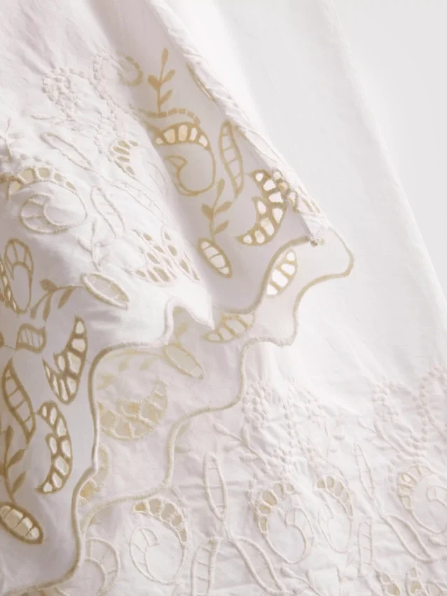 Pantalones de algodón de pierna ancha con bordados