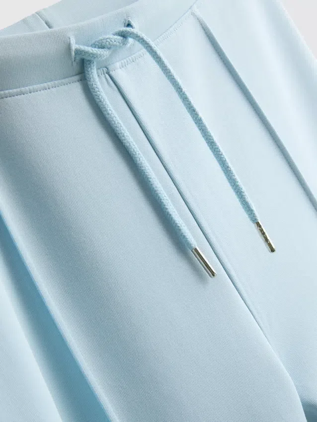 Pantalones de chándal acampanados con pliegues, con alto contenido de algodón