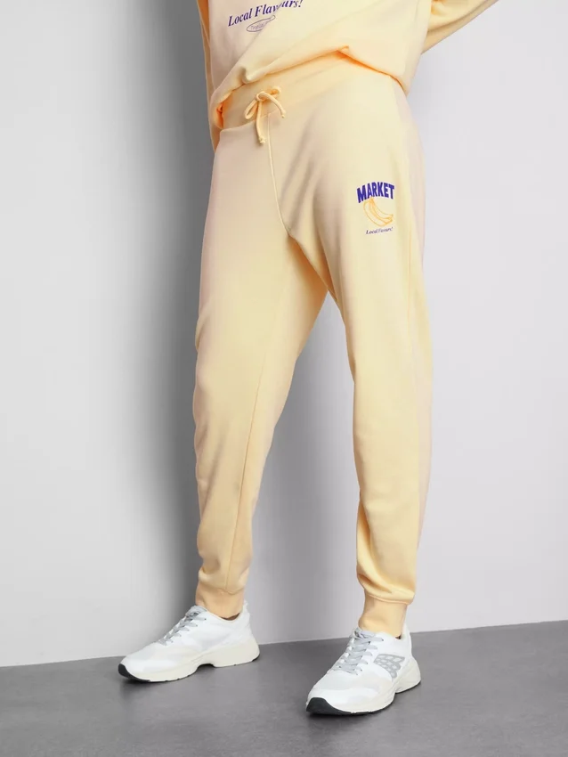 Pantalones de chándal ajustados estampados de mezcla de algodón