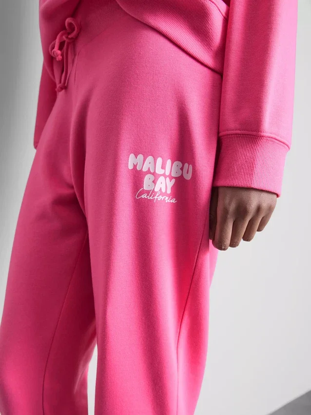 Pantalones de chándal ajustados estampados de mezcla de algodón