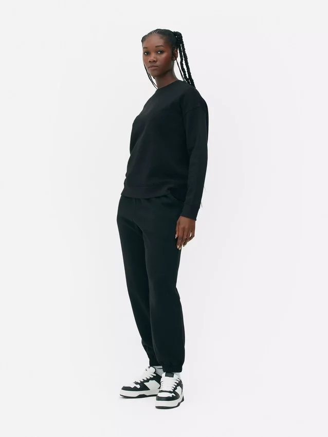 Pantalones de chándal con cordón y puños en las perneras