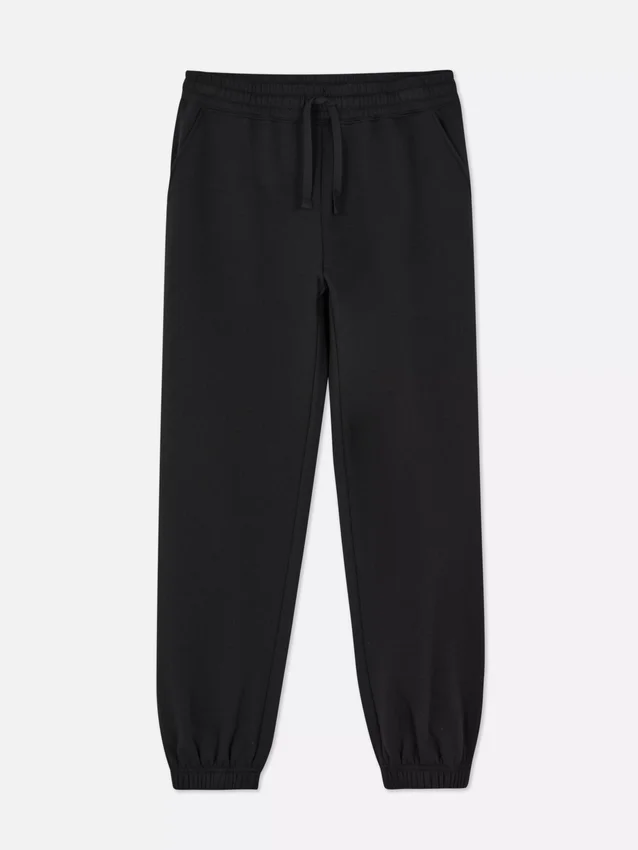 Pantalones de chándal con cordón y puños en las perneras