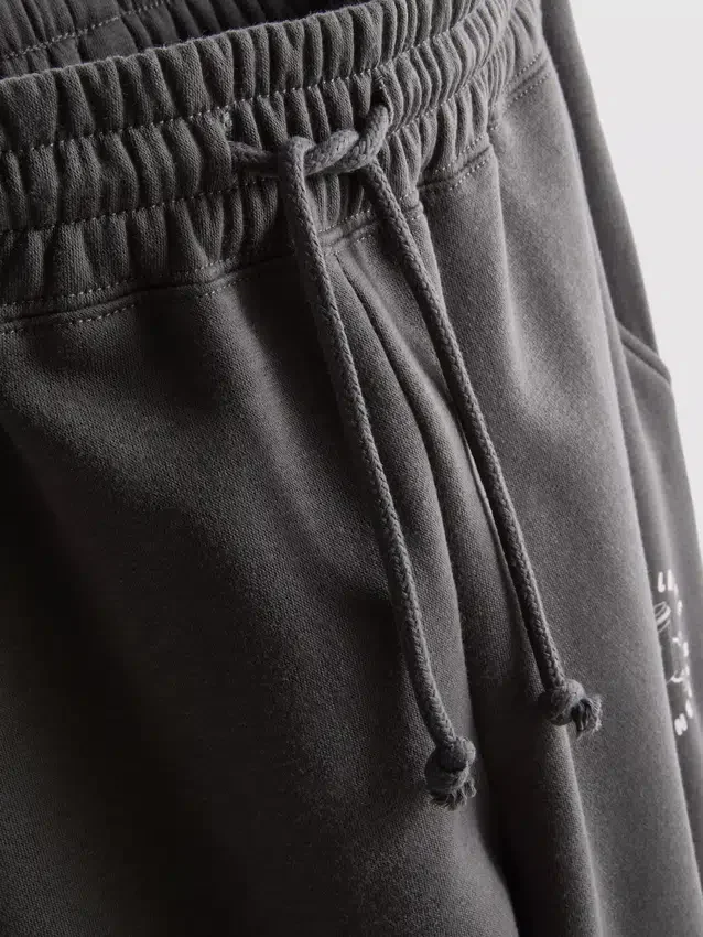 Pantalones de chándal con puños estampados de mezcla de algodón