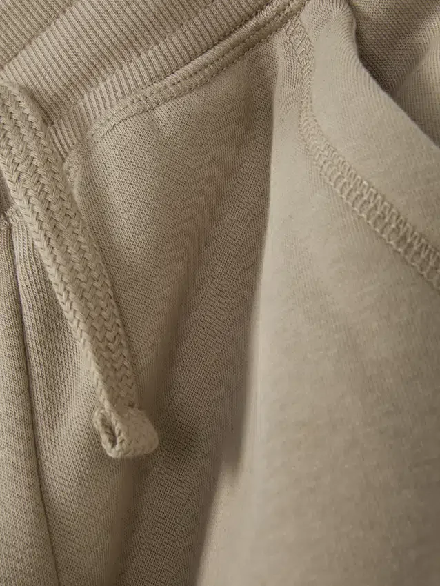Pantalones de chándal con puños y cordón