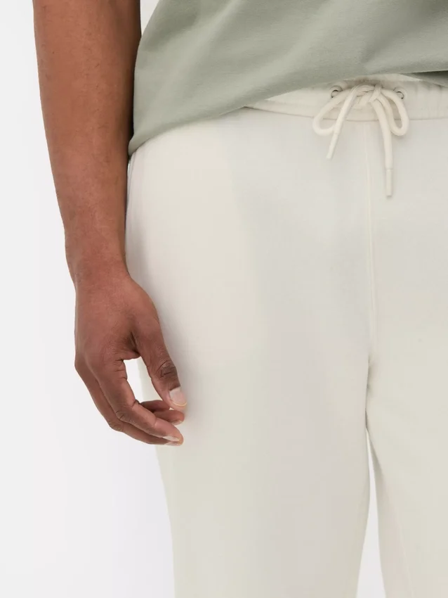 Pantalones de chándal con puños y cordón
