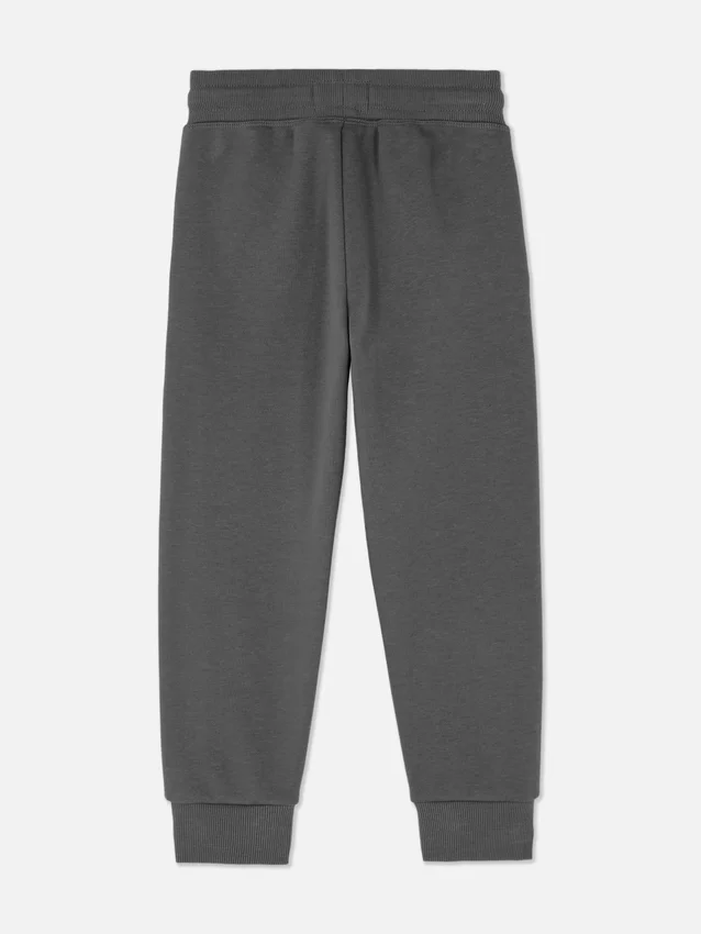 Pantalones de chándal con puños y cordón