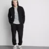 Pantalones de chándal elásticos con cintura elástica y puños