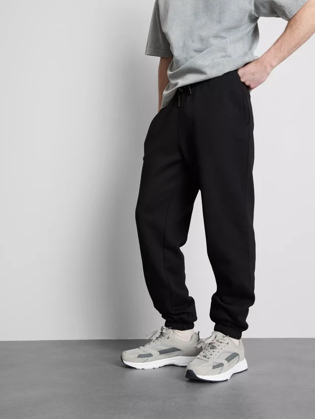 Pantalones de chándal elásticos con cintura elástica y puños