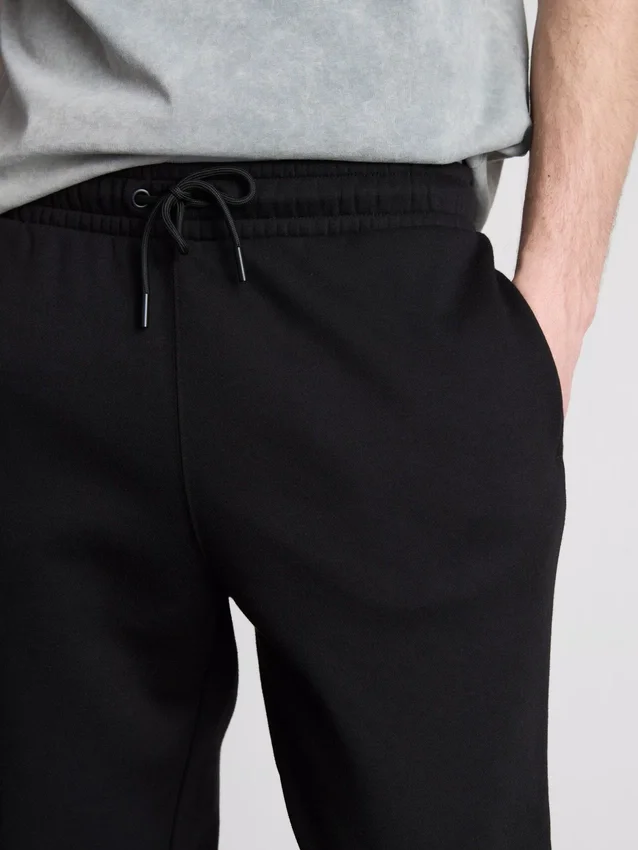 Pantalones de chándal elásticos con cintura elástica y puños