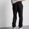 Pantalones de chándal elásticos con cintura elástica y puños