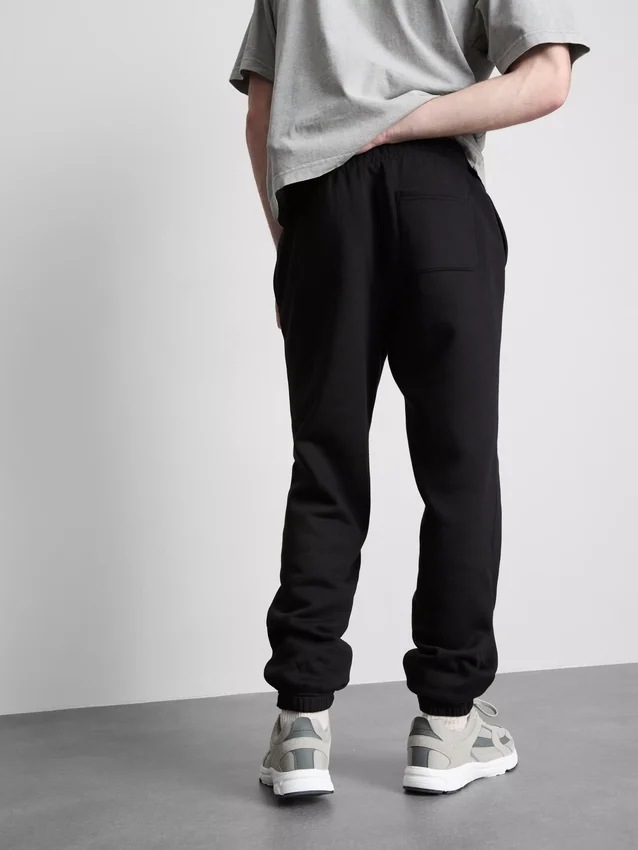 Pantalones de chándal elásticos con cintura elástica y puños