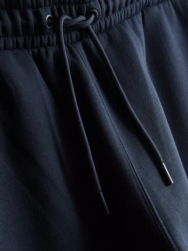 Pantalones de chándal elásticos con cintura elástica y puños