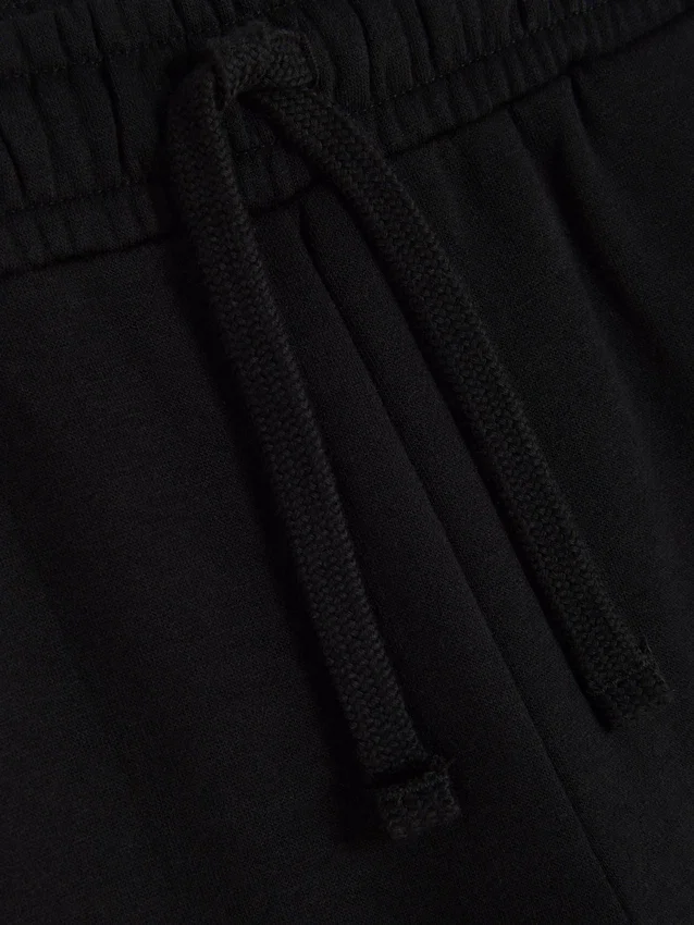 Pantalones de chándal elásticos con cordón