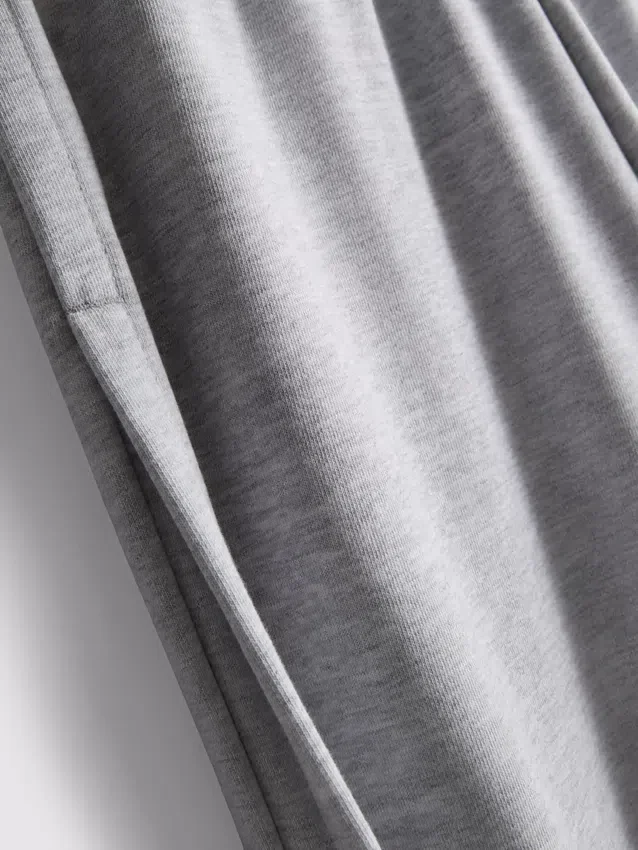 Pantalones de chándal plisados de pierna ancha con alto contenido de algodón
