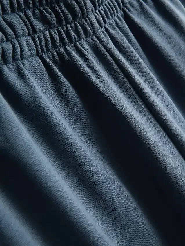 Pantalones de chándal plisados de pierna ancha con alto contenido de algodón