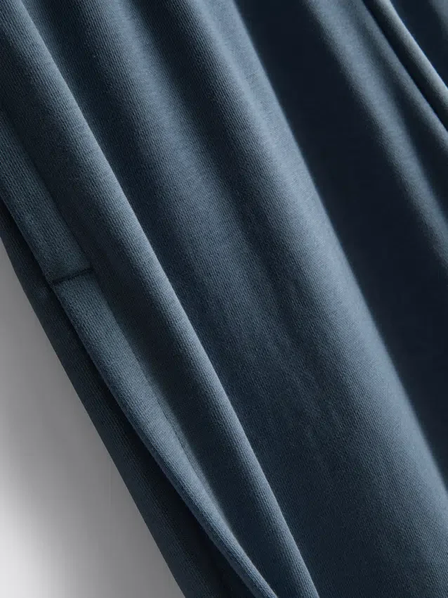 Pantalones de chándal plisados de pierna ancha con alto contenido de algodón