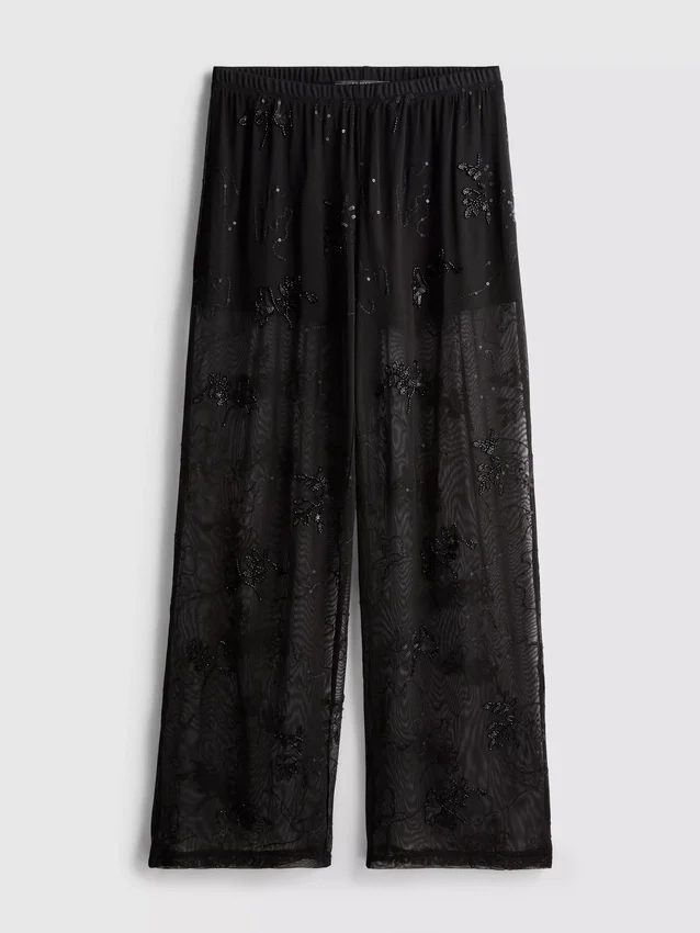 Pantalones de malla con cuentas y pierna ancha de Paula Echevarría