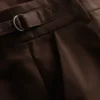 Pantalones de pierna ancha con pliegues y detalle de cinturón